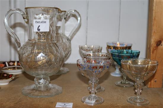 Pair of cut glass jugs each with gilt decoration and 6 Venetian sweetmeat glasses